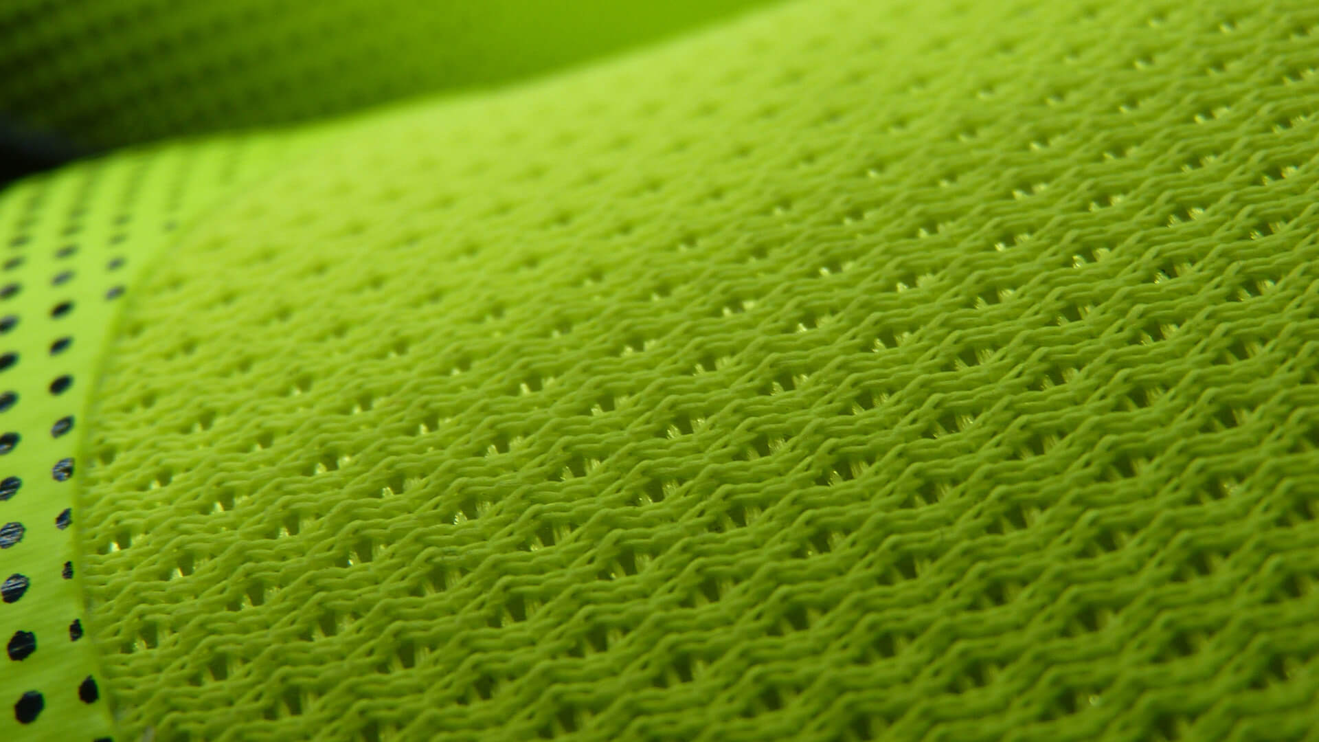 Primo piano di un materiale tecnico di colore verde di INNTEXA